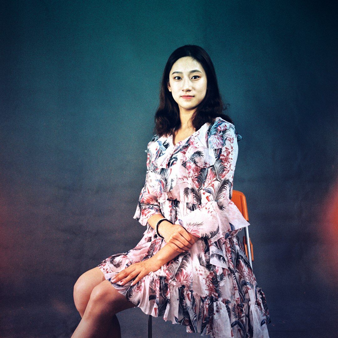 Studio portrait of an elegant Swiss-French female television host